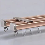 Aluminiowy system prowadnic kurtynowych